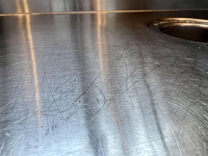Can scratches on stainless steel be buffed out?