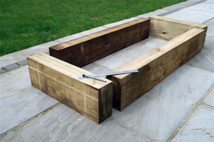 How do you fix sleepers for raised beds?