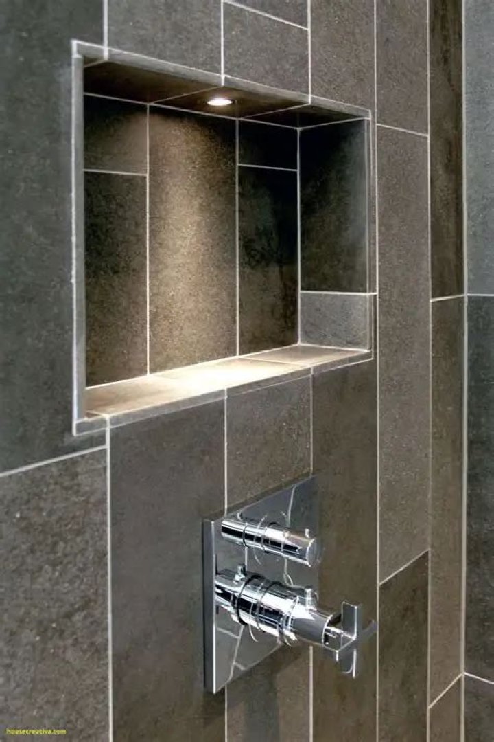 What order do you tile a shower?
